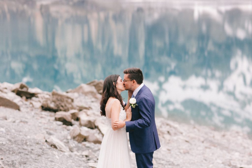 Bride and Groom kissing each other