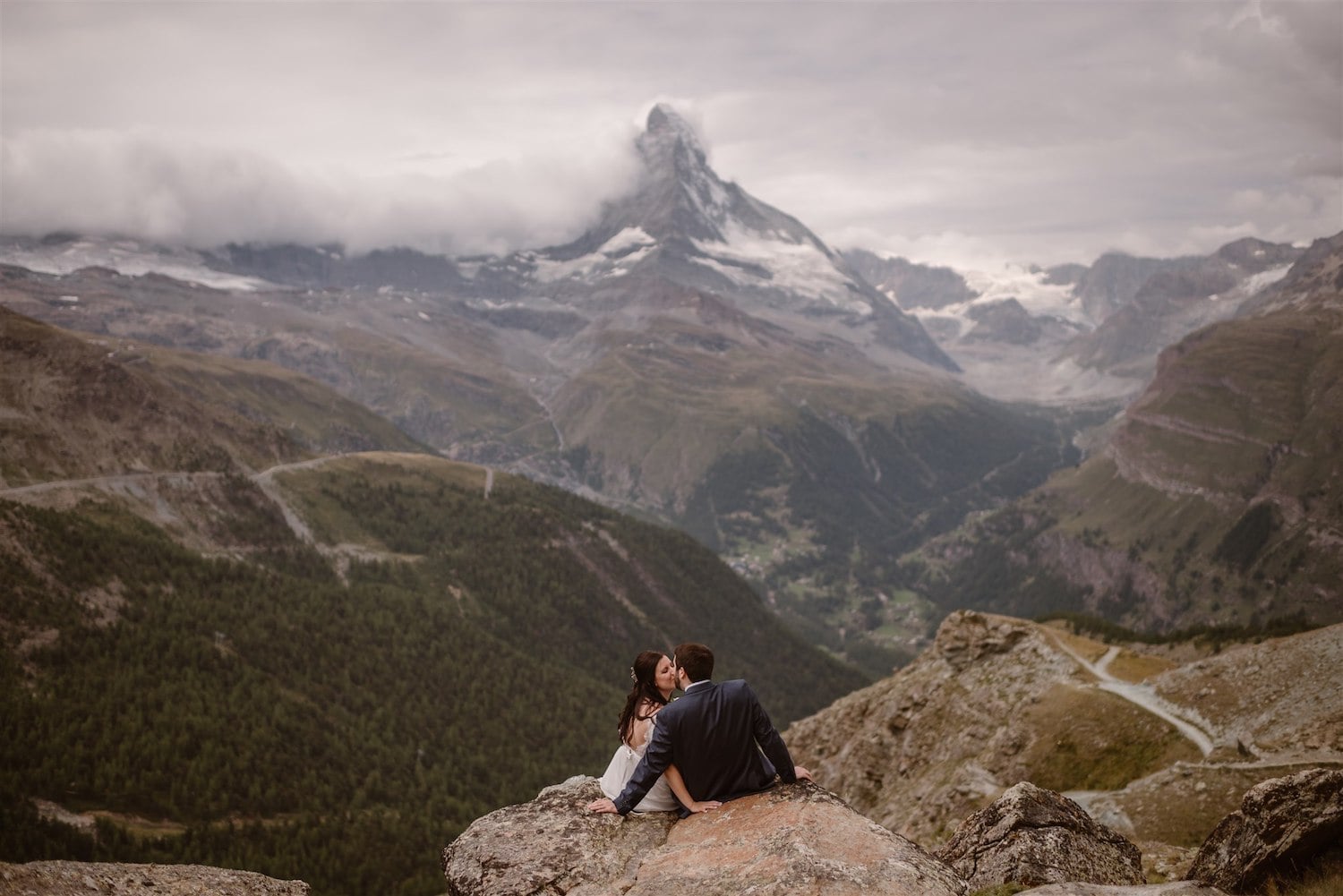 Lovers kissing in front of the Matterhorn in Zermatt, Switzerland