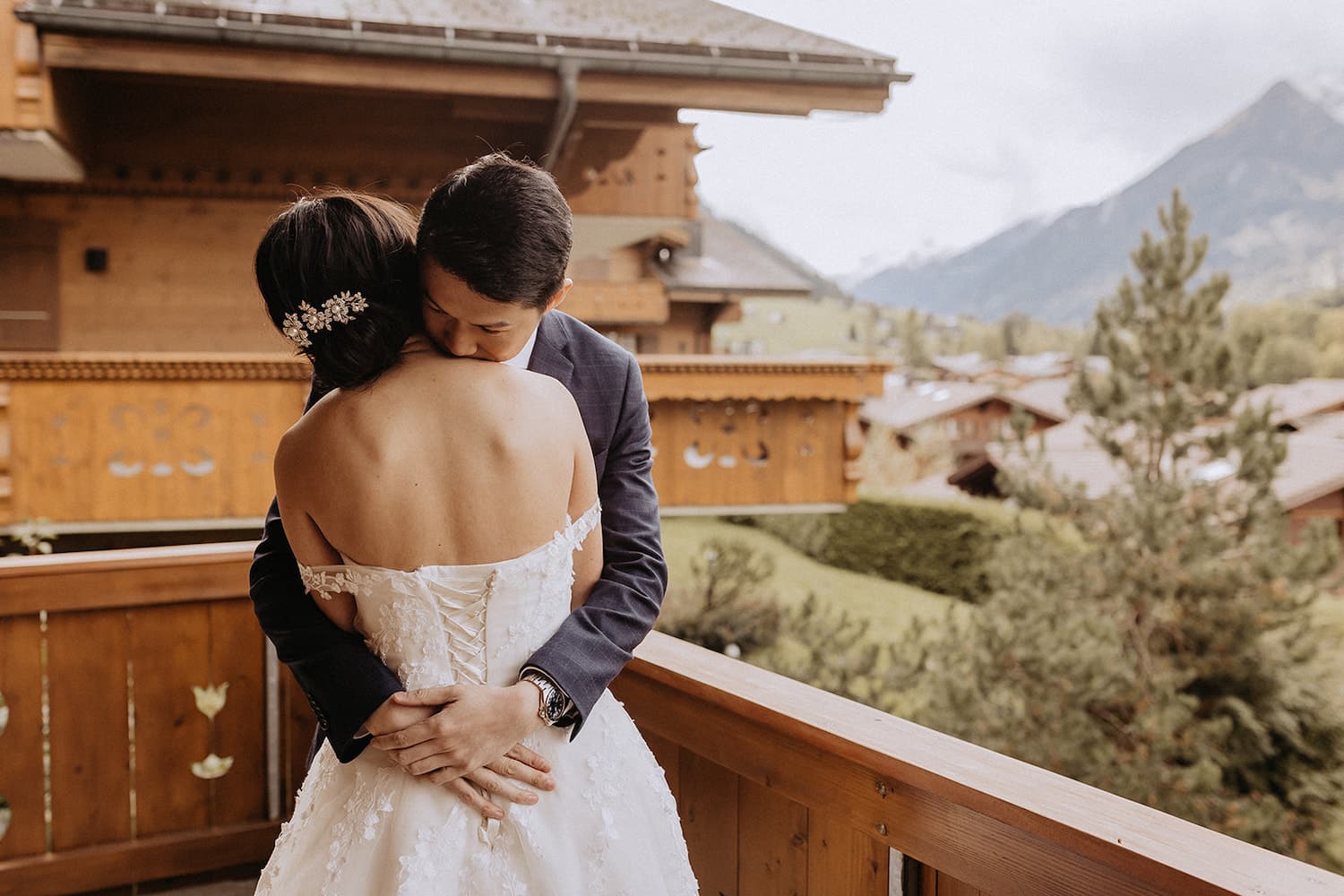 Couple hugging before their elopement ceremony in Gstaad
