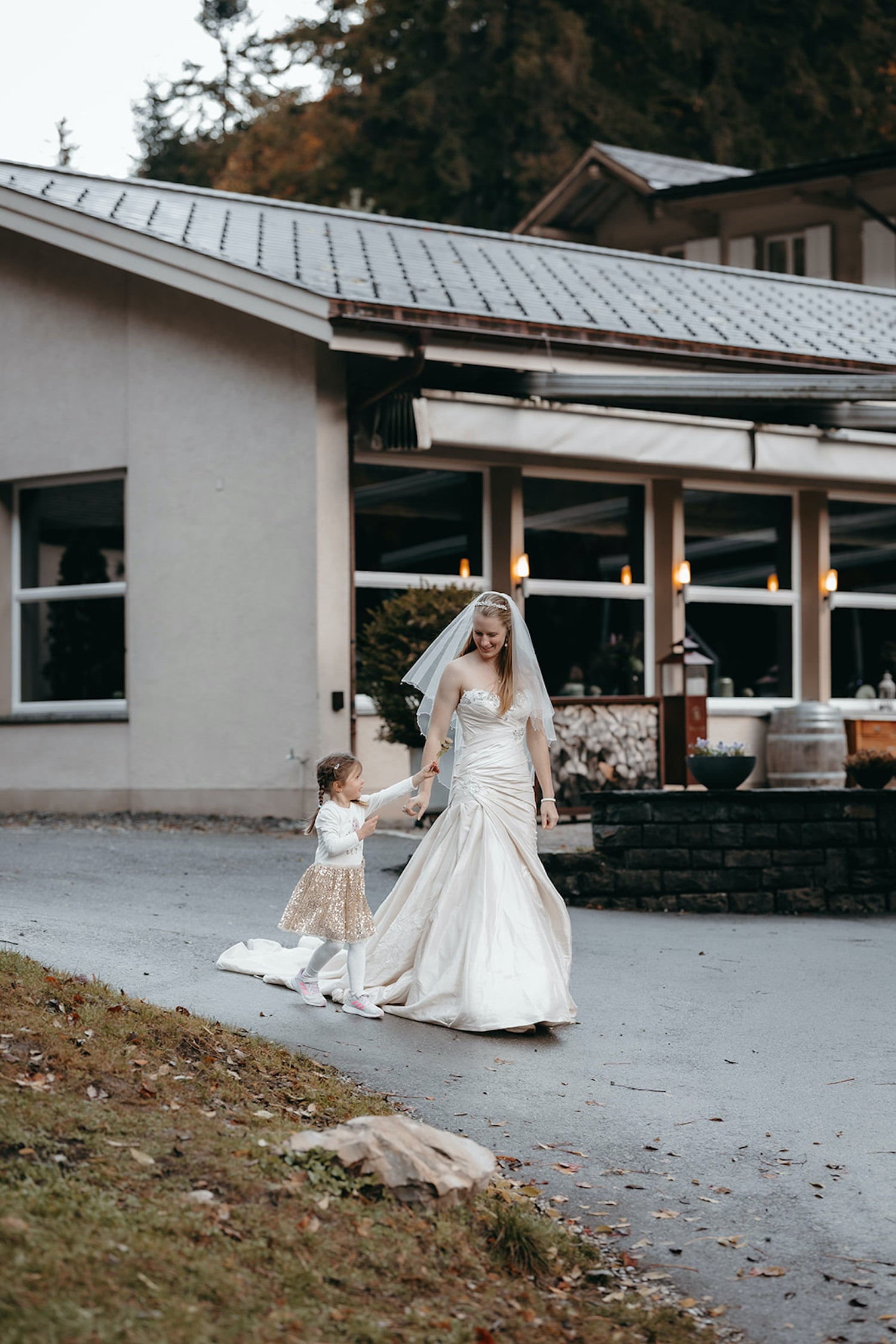 bride with her daughter during an elopement in blausee