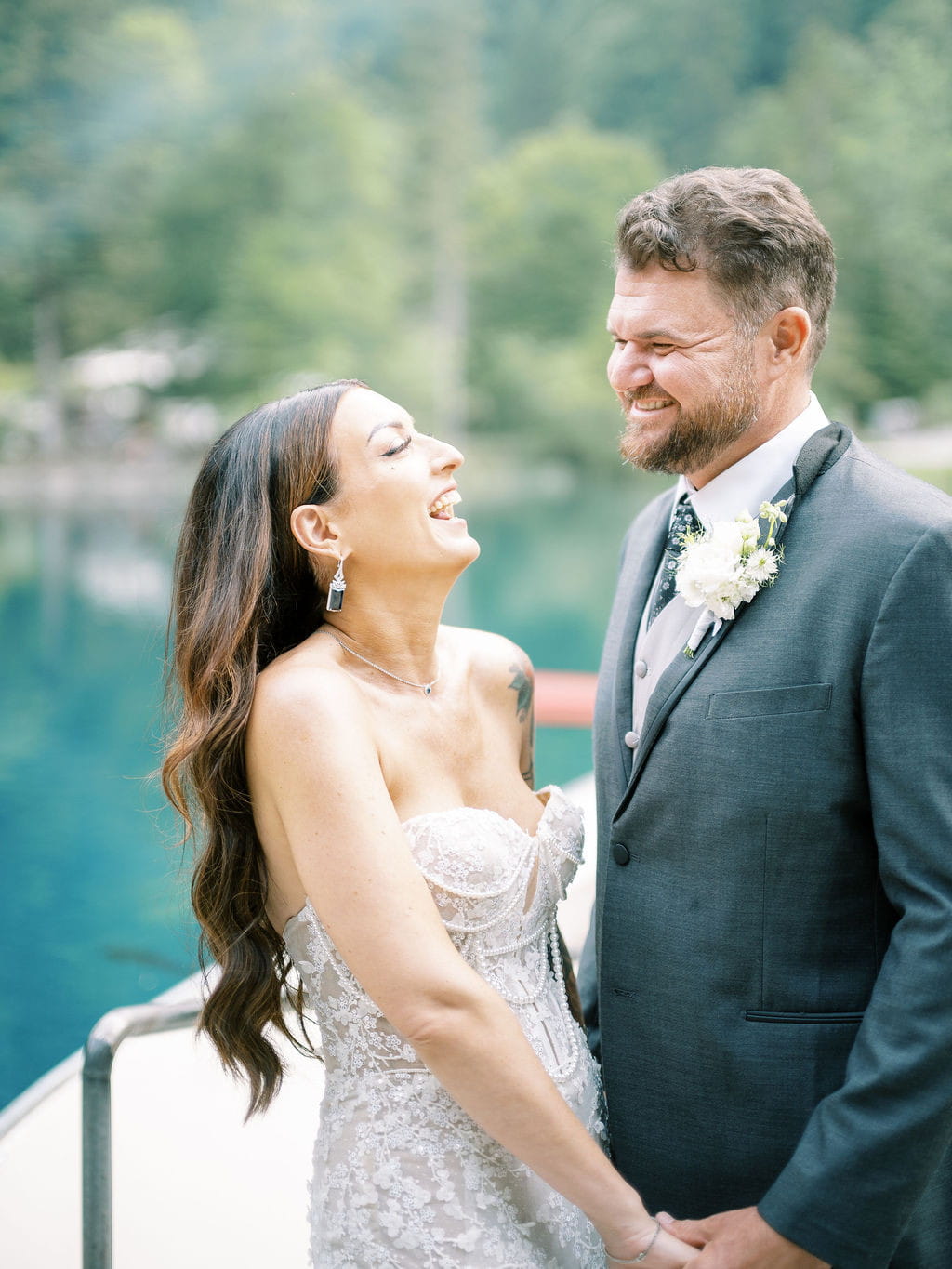 couple smiling during their wedding at Blausee